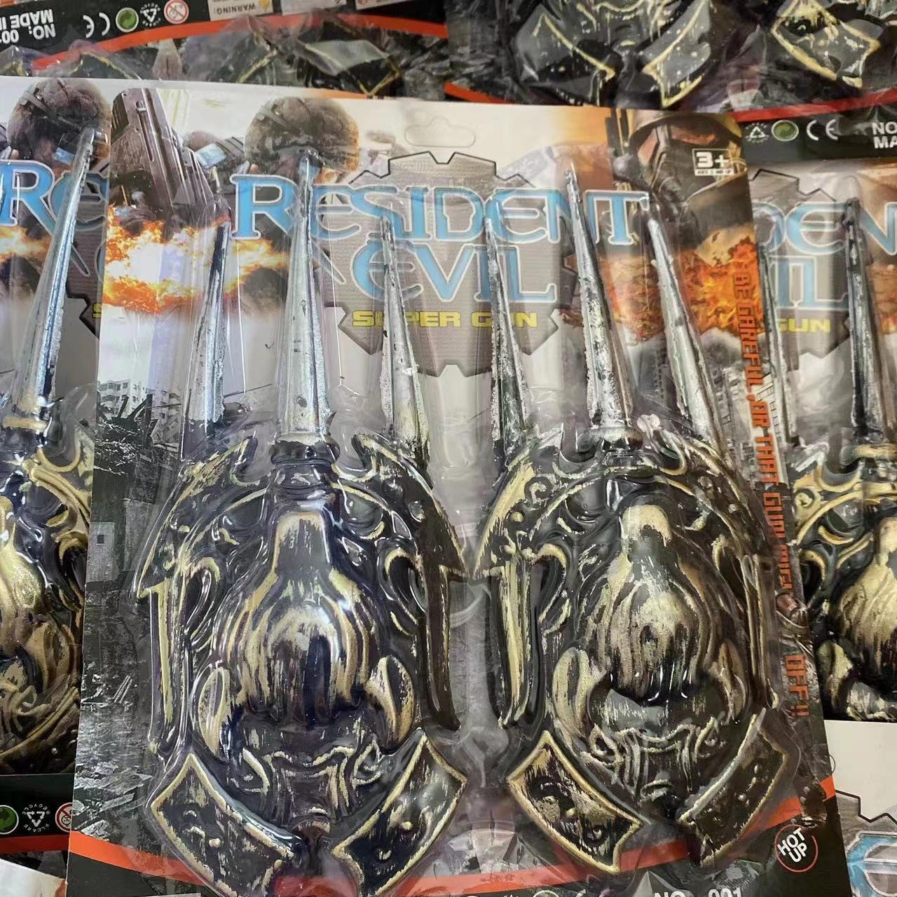 Juguetes para niños modelo de automóvil de plástico pistola arco y flecha tarjeta de succión pistola conjunto de anillo 2 yuanes tienda departamental al por mayor