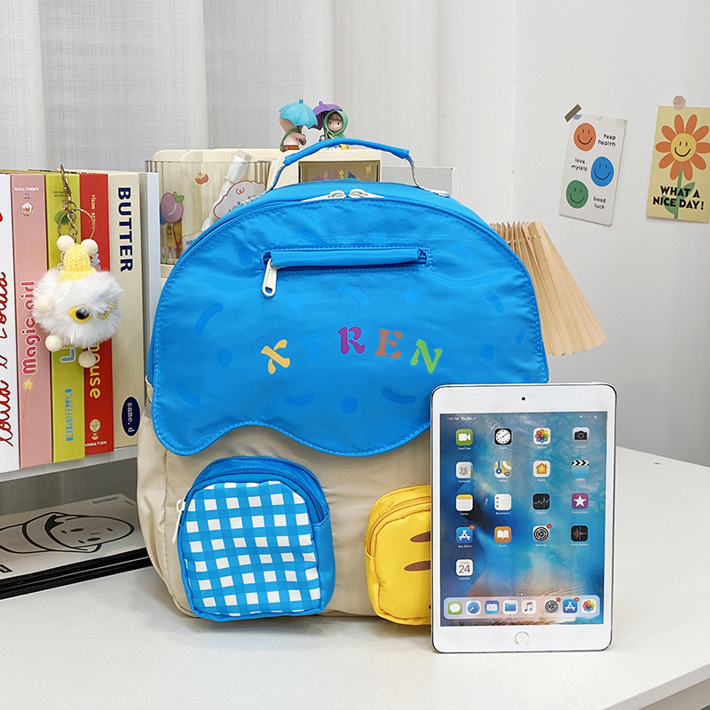 Nueva mochila infantil, jardín de infantes, mochila escolar ligera para niños y niñas, moda de color, mochila casual para padres e hijos.