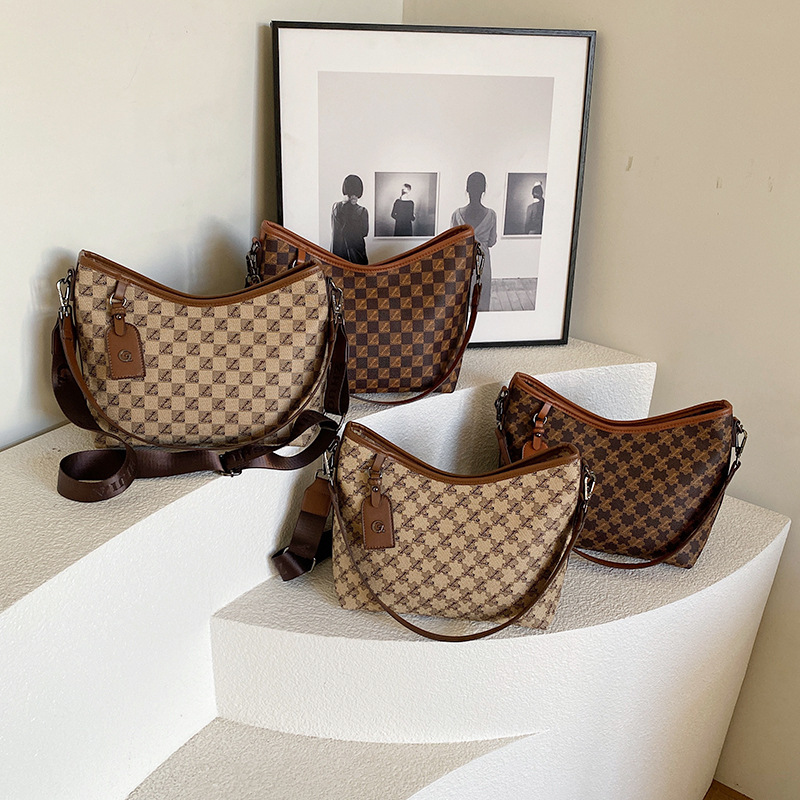 Bolso de moda transfronterizo para mujeres 2024 nuevo diseño de nicho bolso de hombro clásico bolso de mensajero del todo fósforo