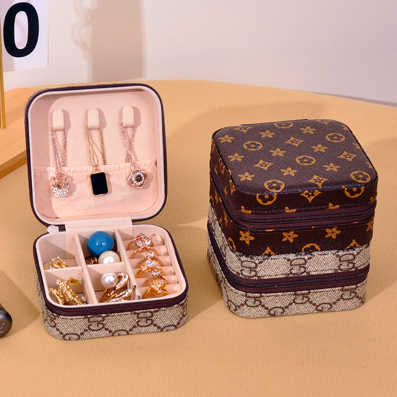 Pu caja de almacenamiento de joyería fabricantes de pendientes collares embalaje de joyería caja de almacenamiento anillo casero caja de joyería portátil
