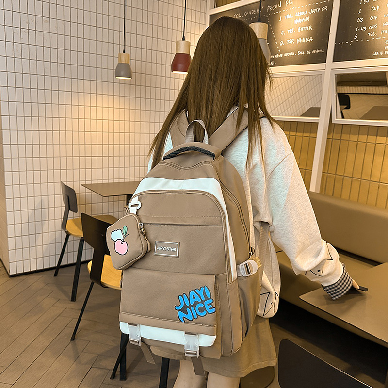 Niña japonesa estilo ins, mochila escolar ligera y linda, simple y versátil, mochila de gran capacidad para estudiantes universitarios de secundaria y preparatoria