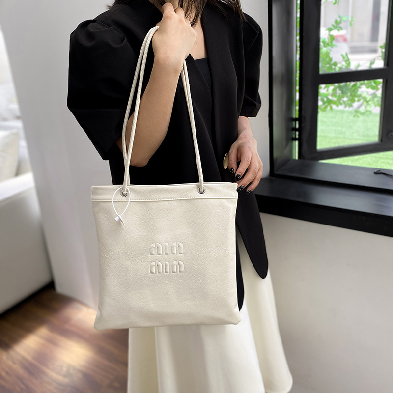 Bolso tote nuevo 2025, moda para ir al trabajo, bolso de hombro de gran capacidad, bolso informal y elegante, bolso versátil para mujer con cremallera