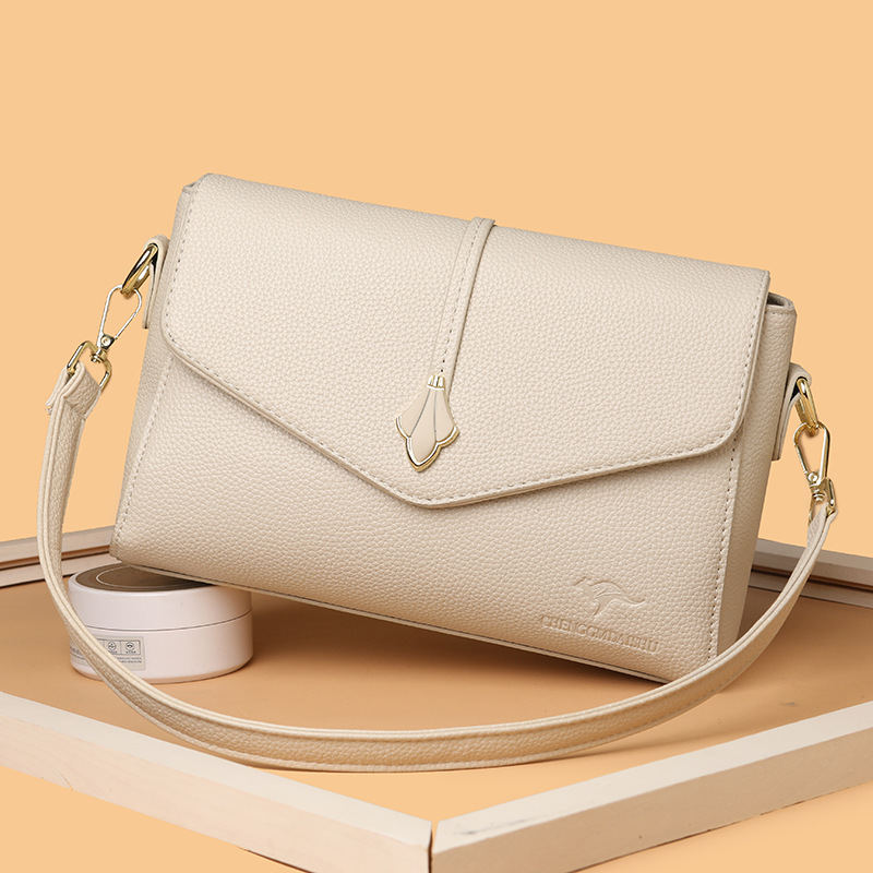 Bolso de moda para mujeres 2026 nuevo bolso pequeño de cuero suave bolso de madres de mediana edad bolso de hombro de gran capacidad bolso de mochila