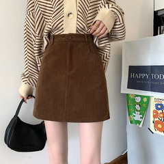 秋のカレー色の半身のスカートの女性の大きいサイズの太っているmmのコーデュロイのスカート