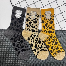 2025秋冬新款欧货袜子女个性潮袜重工烫钻小猫豹纹棉袜堆堆中筒袜