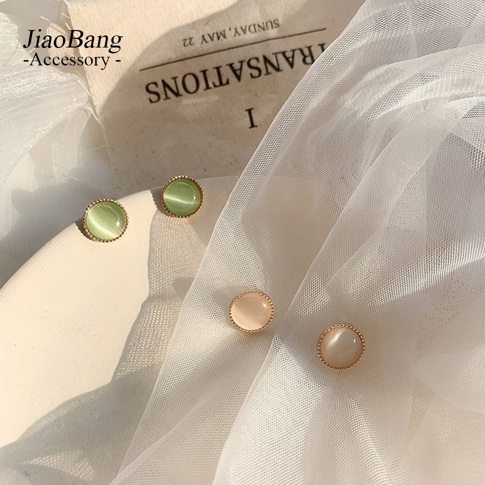 Aguja de plata Versión coreana de ópalo Pendientes de celebridades de Internet Pendientes de temperamento diario simple de nicho femenino Pendientes pequeños y exquisitos al por mayor