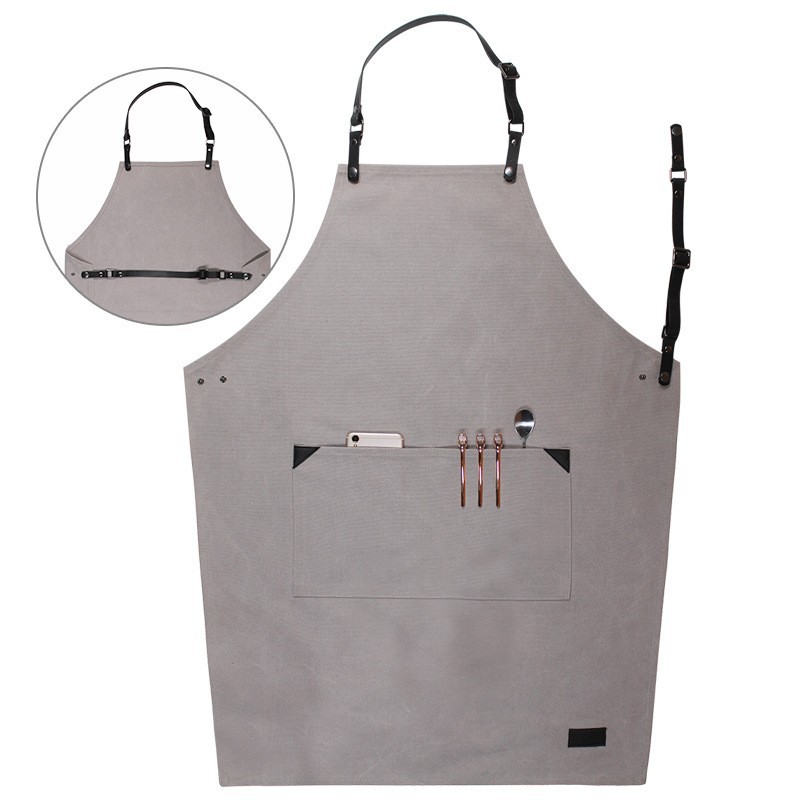 Comercio exterior delantal de lona gruesa peluquería cafetería panadería ropa de trabajo PU cuero correa ajustable delantal al por mayor
