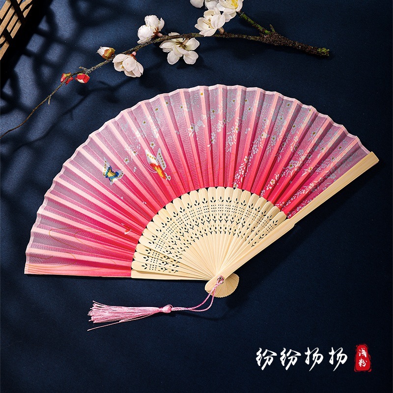 古代のチャイナドレスの女性の漢服の子供のダンスの桜の扇の中国風の夏は桃の花の扇子を身につけて古風を扇に折ります。|undefined
