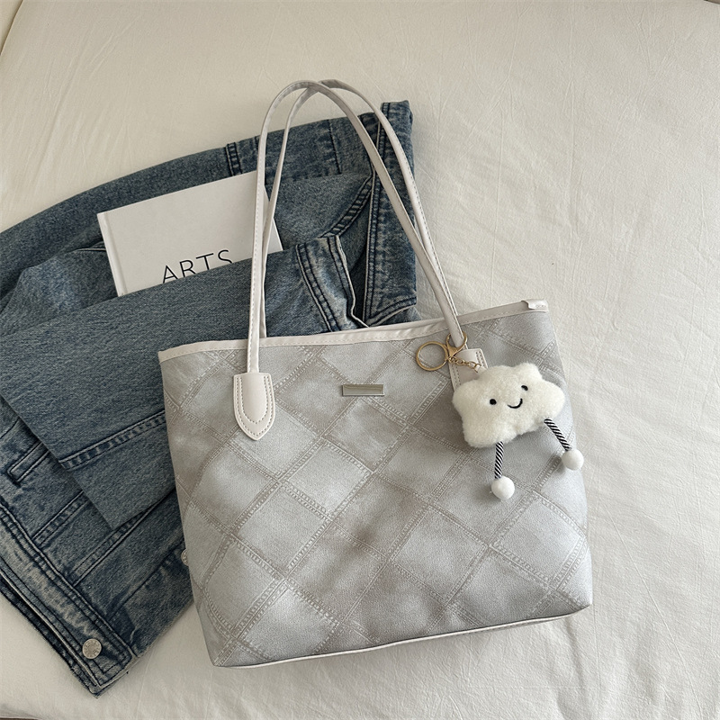 Casual retro bolso de gran capacidad para mujeres 2024 nueva moda moda bolso de hombro de tendencia de textura universal bolso de viaje