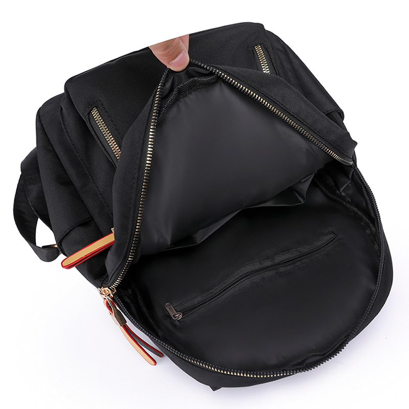 2024 nueva mochila de nailon para mujer, moda europea y americana, color de contraste de gran capacidad, mochila de viaje ligera al aire libre, mochila escolar