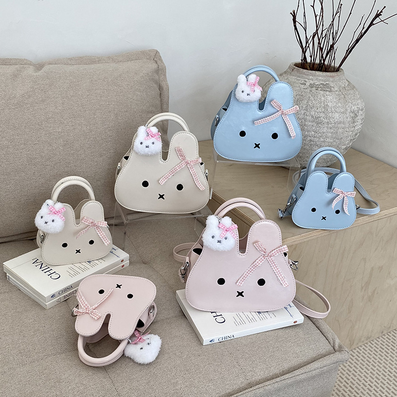 Bolsos para niños bonitos y divertidos conejos de dibujos animados bolsos de hombro para niños y niñas mini lindos con colgentes bolsos de cambio para niñas pequeñas