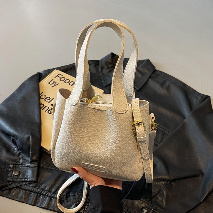 Bolsa de mano ocio transfronteriza versátil para mujeres 2025 nuevo estilo popular retro bolso de cubo de alta calidad simple mochila