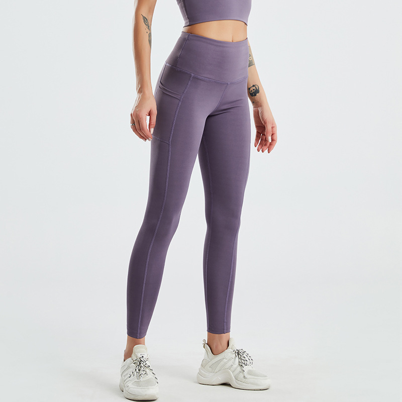 Amazon tamaño europeo pantalones de yoga transfronterizos bolsillo lateral de las mujeres melocotón cintura alta Levantamiento de cadera medias de fitness europeas y americanas