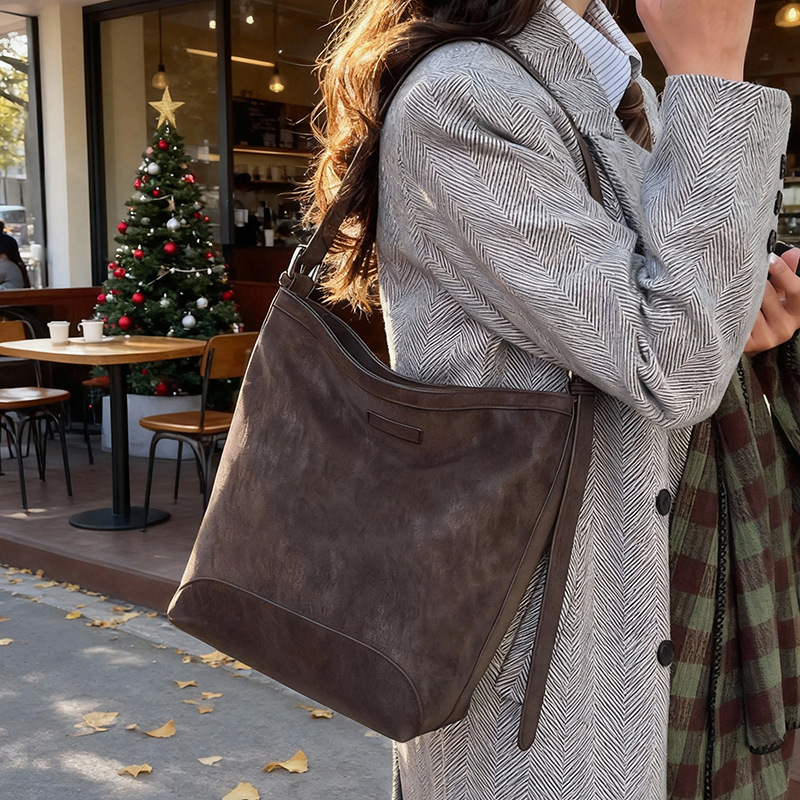 2025 nuevo bolso de brazo de viaje universal bolso de viaje de viaje de mujer simple retro mochila de hombro bolso de cubo