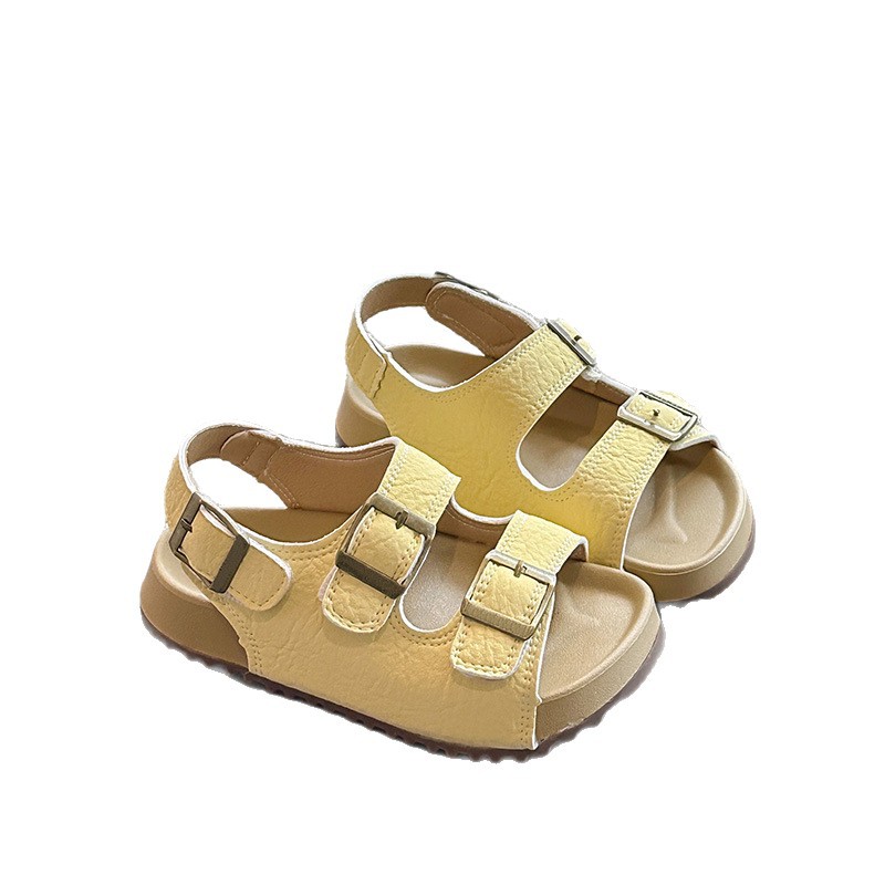 2026 verano nuevas sandalias de niñas con cabeza hueca coreana zapatos de princesa para niños zapatos de playa suaves antideslizantes