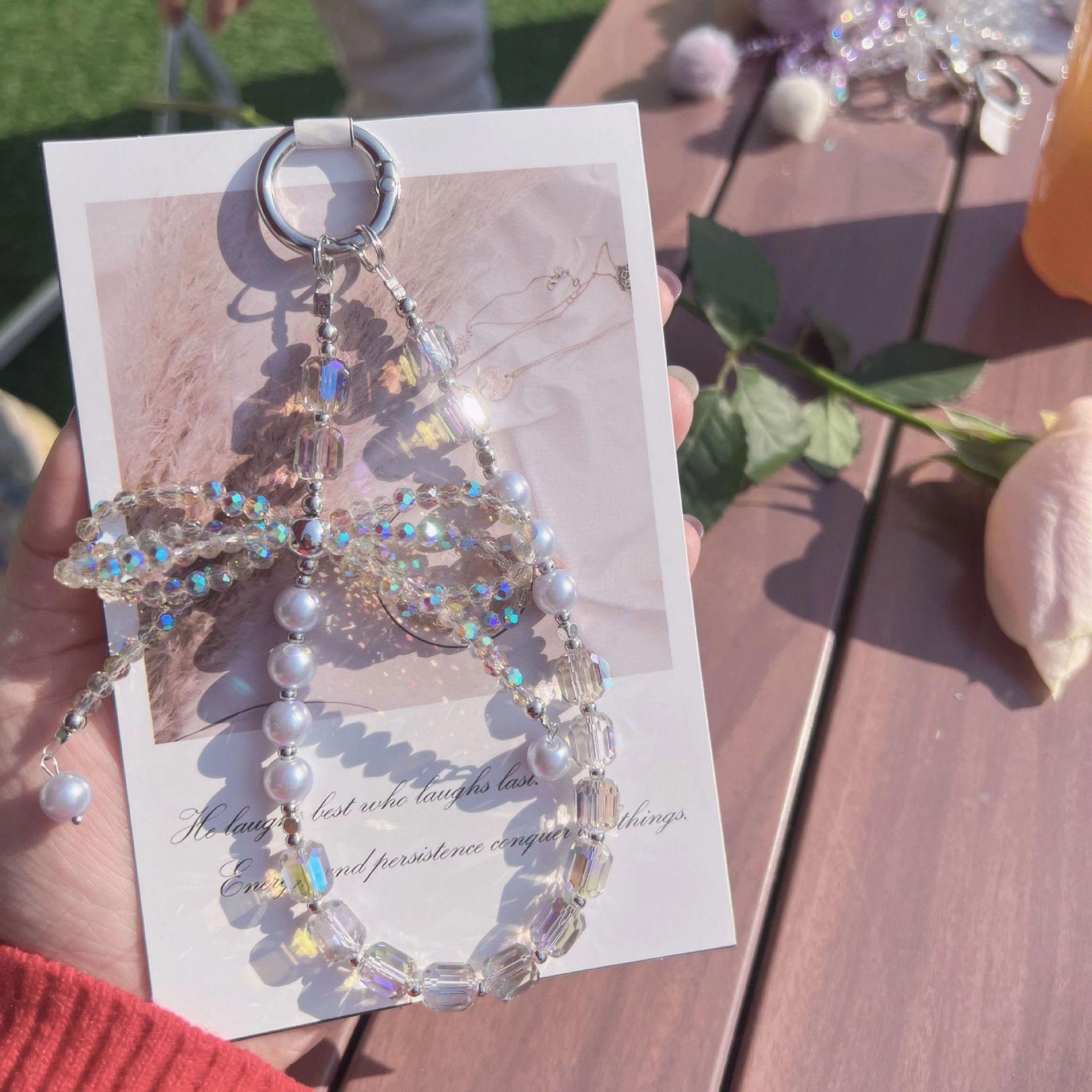 Lazo de perlas de lujo cadena de teléfono móvil cordón de teléfono móvil de alta gama cristal tridimensional corto exquisito cordón de muñeca ins