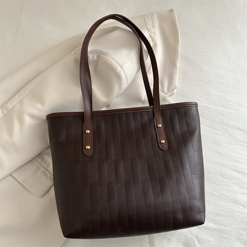 Personalidad de la bolsa de gran capacidad para mujeres invierno 2024 nueva moda mochila casual textura clase de viaje bolsa