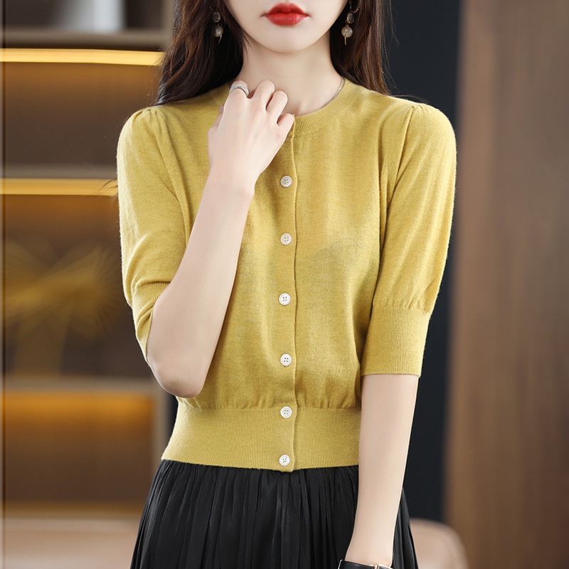 Woolen knitted cardigan with a round collar
