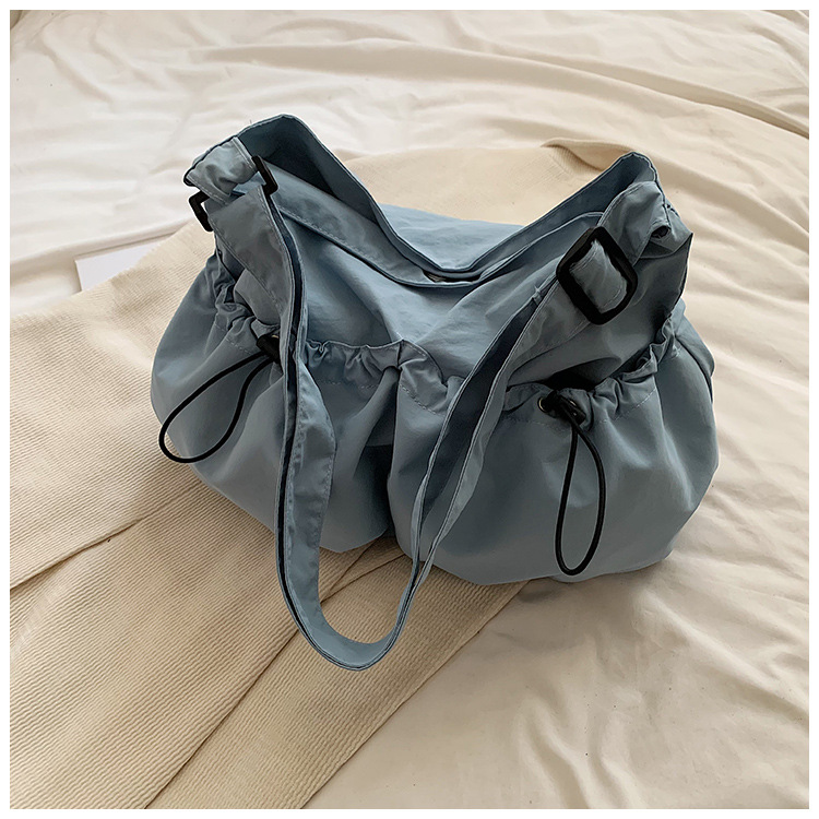 Bolsa de lona de gran capacidad para mujeres 2024 nuevo bolso de hombro casual simple de verano con un sentido de alta calidad de la bolsa de viaje