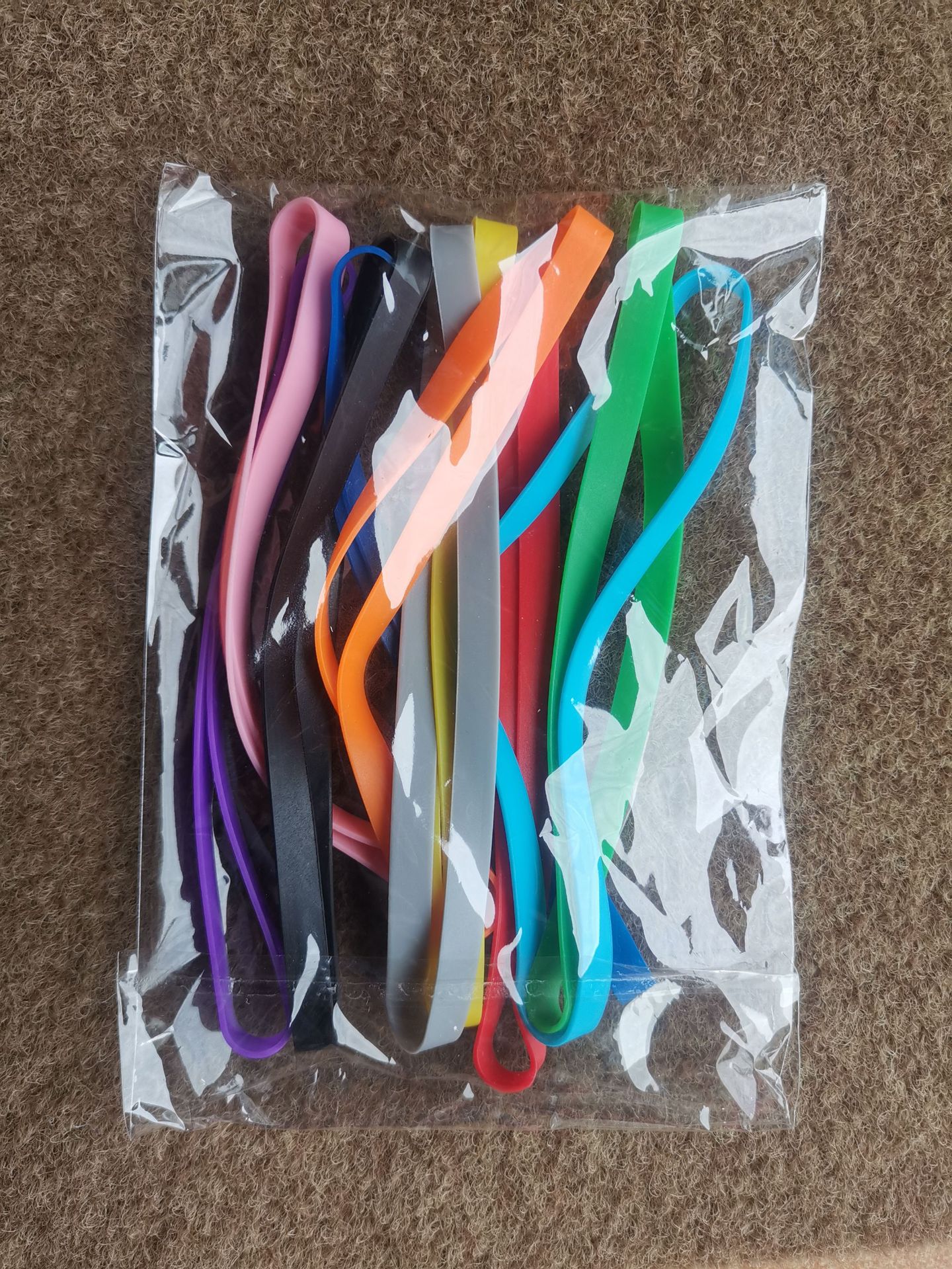 A06 # largo 135*7*1 en stock correa de libro de silicona elástica al por mayor 12 color lápiz caso correa de silicona