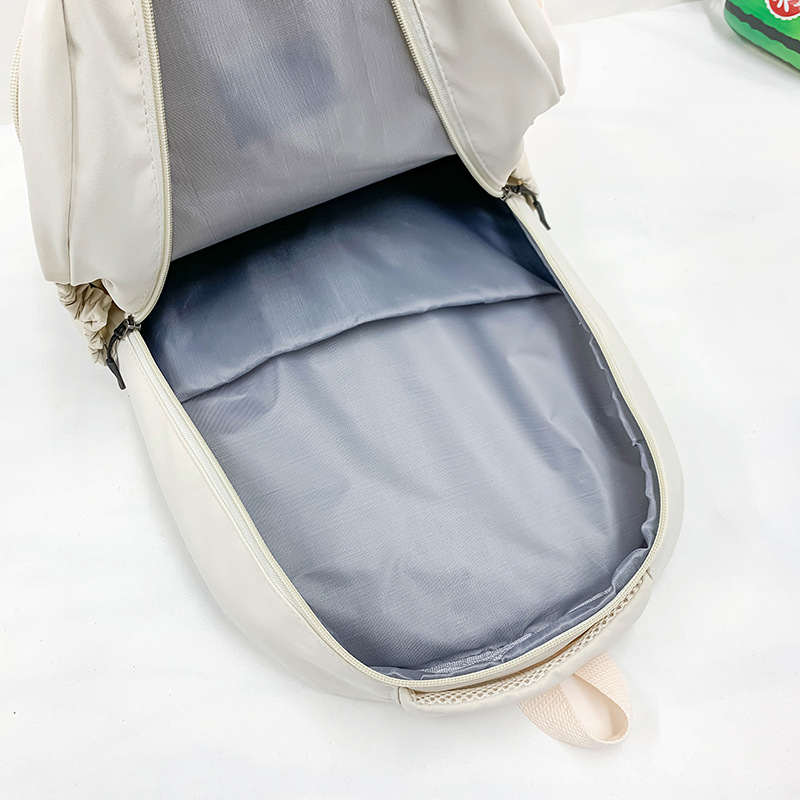 Mochila de comercio exterior 2023 nueva mochila de estudiante de escuela primaria y secundaria coreano simple Harajuku mochila popular en línea al por mayor