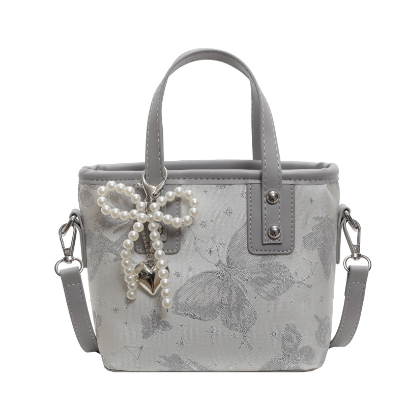 Bolsa de cubo de mano para mujeres 2025 nuevo estilo nacional popular bolso de hombro alta textura versátil bolso de moda moda