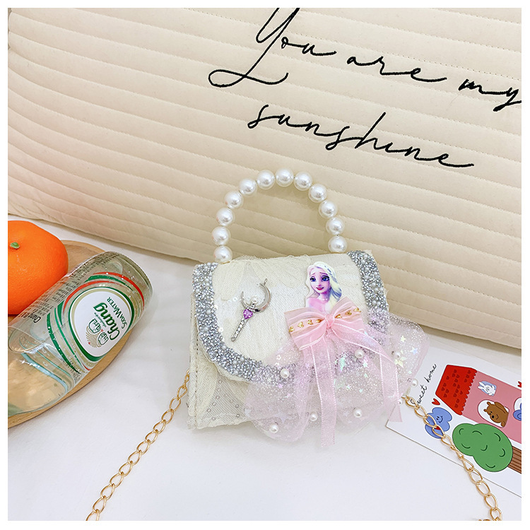 Nuevo bolso de moda para niños bolso de perla animado lindo arco de botón bolso de hombro de niñas cadena diagonal bolso pequeño