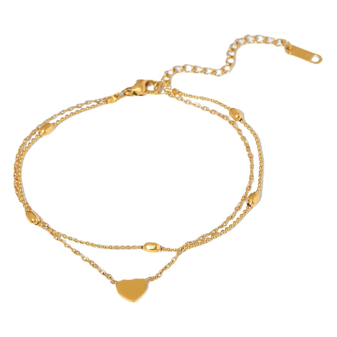 Europeo y americano INS nueva tobillera de acero de titanio 18K oro amor colgante Oval Cadena de cuentas tobillera de doble capa de la joyería de la tobillera de las mujeres