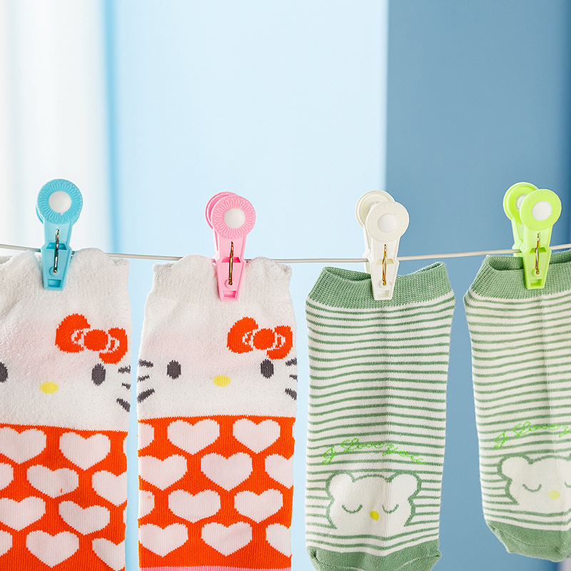 Pinzas pequeñas de plástico con resorte metálico, coloridas, para ropa o uso multifuncional.