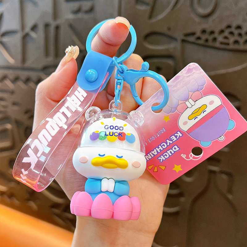 Creativo nuevo toque budista patito llavero lindo bolso colgante llavero de automóvil pequeño regalo al por mayor image 9