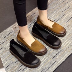 春の新型のレトロなミルク靴の本革の底の浅い口の1足は女性の靴の滑り止めの柔らかい底の妊婦の靴の女性の靴を漕ぎます。