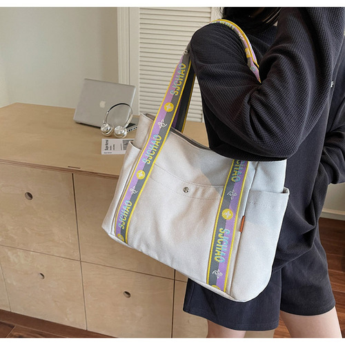 Cross-border canvas bag for women, large capacity, 2025 new style, popular versatile casual single-shoulder shopping bag, tote bag for college students