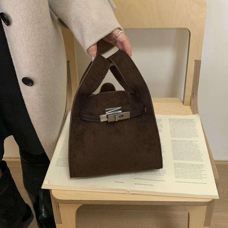 Nicho coreano Zhong esmerizado bolso de cubo de viaje mujer otoño / invierno 2025 nueva moda versátil bolso de hombro