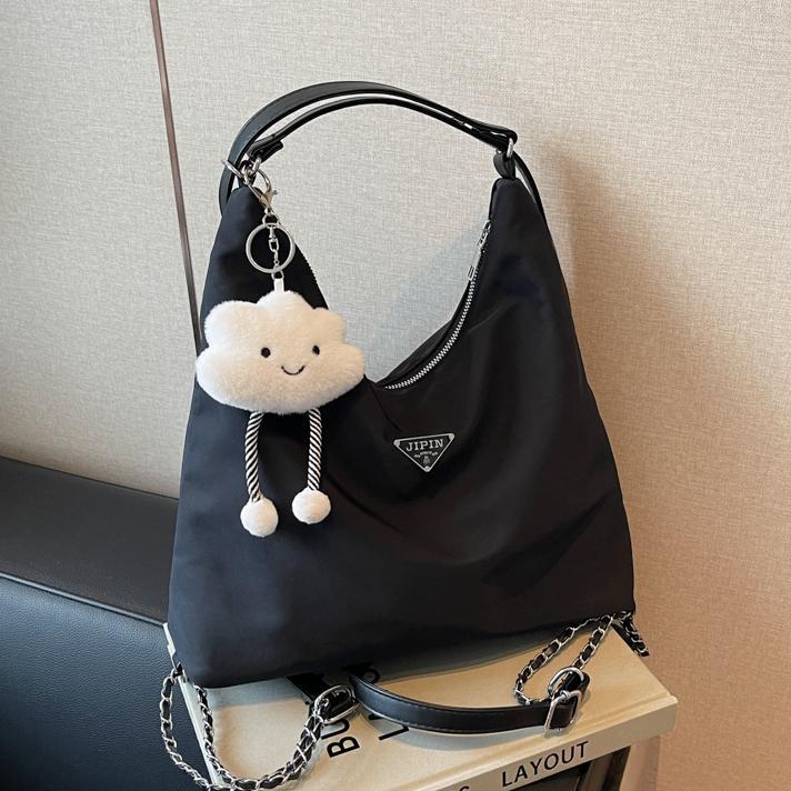 Bolsa de gran capacidad para mujeres 2024 nueva mochila multifuncional de tres usos, sensación de alto nivel, mochila de hombro para viajes casuales versátiles.