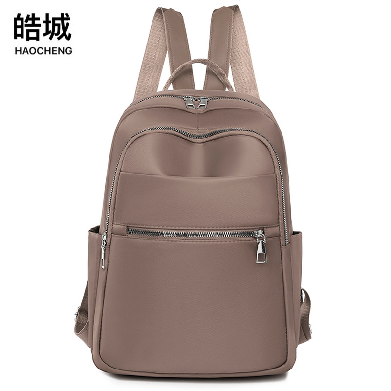 2023 nueva mochila de tela Oxford para mujer coreana, mochila de viaje ligera al aire libre simple de moda, mochila escolar para estudiantes