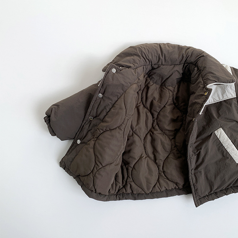 Hombres y niñas de algodón 2025 invierno nuevo chaqueta de algodón para niños coreano engrosado calentamiento ropa superior de niños al por mayor