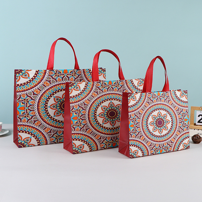 Bolsas de mano no tejidas al por mayor bolsas de embalaje estereoscópicas resistentes al desgaste bolsas de embalaje de dormitorios de estudiantes bolsas de mano en stock