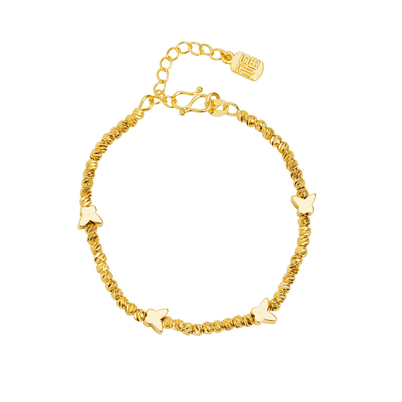 Brazalete de oro de arena de Vietnam lujoso ligero bungee ojo de gato mariposa campana de cuatro hojas brazalete joyería de aleación de cobre al por mayor