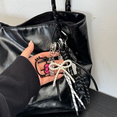 蝶結びかわいいキーホルダー新製品バッグペンダント登山カップルモデル真珠編組ロープバッグペンダントレトロ卸売