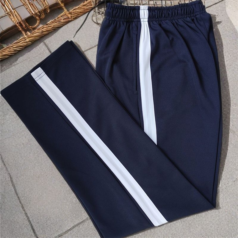School uniform pants in navy blue with a wide white stripe, suitable for middle and high school students, both male and female, in black, loose fit, extra large size