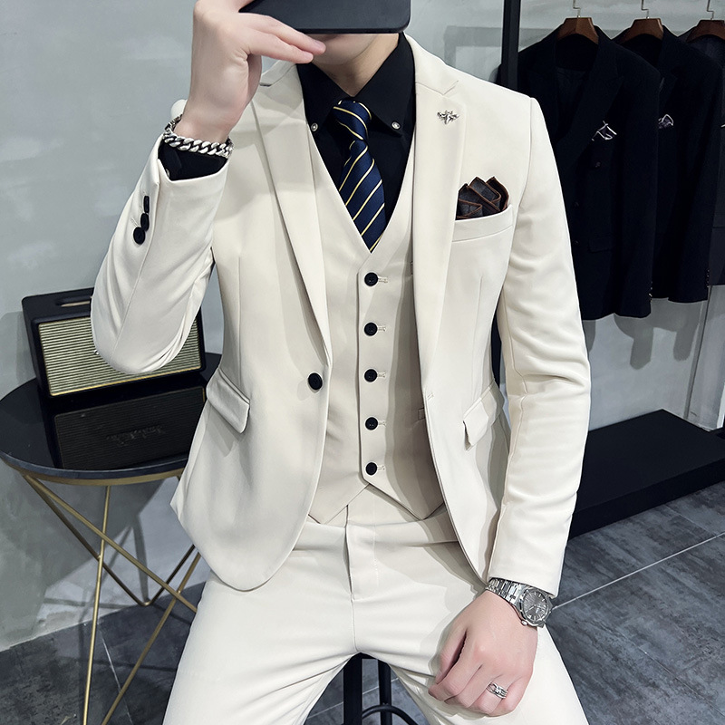 Venta al por mayor de nuevos productos traje de color sólido para hombre 2025 moda casual traje azul delgado coreano para hombre en stock