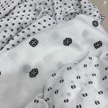 肌理感波浪纹剪花服装面料 黑白小花提花春夏女装时装布料