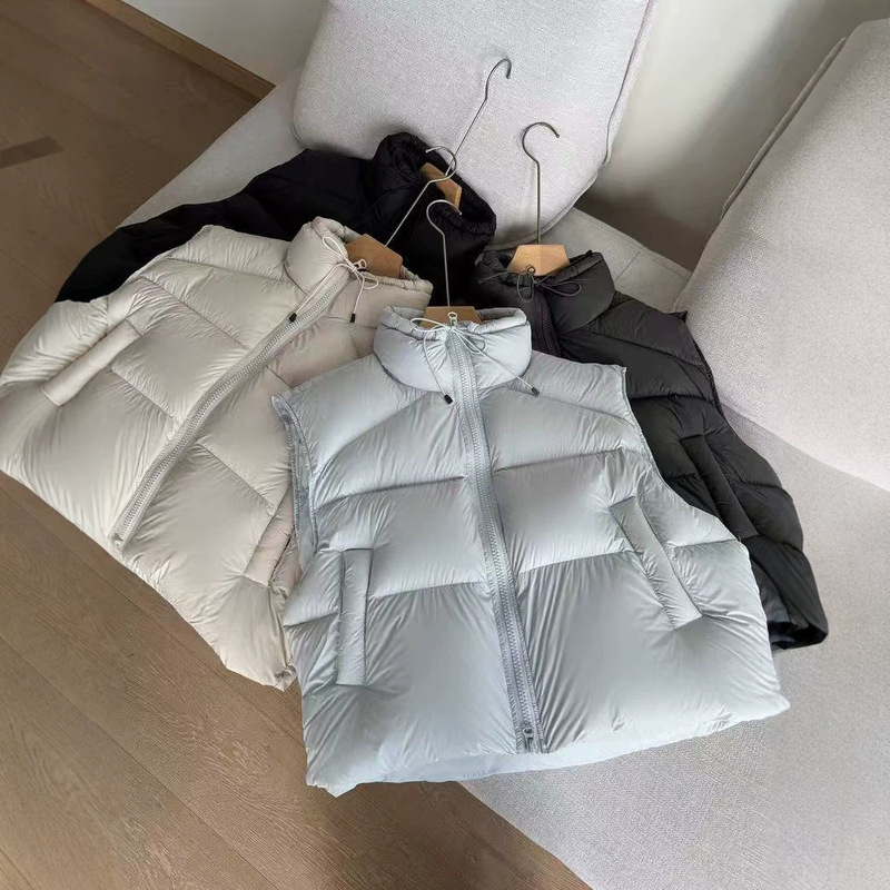 2026 Korean-style short stand-up collar down vest for women, loose-fitting, with drawstring, sleeveless outerwear, women's autumn and winter ribbed vest
