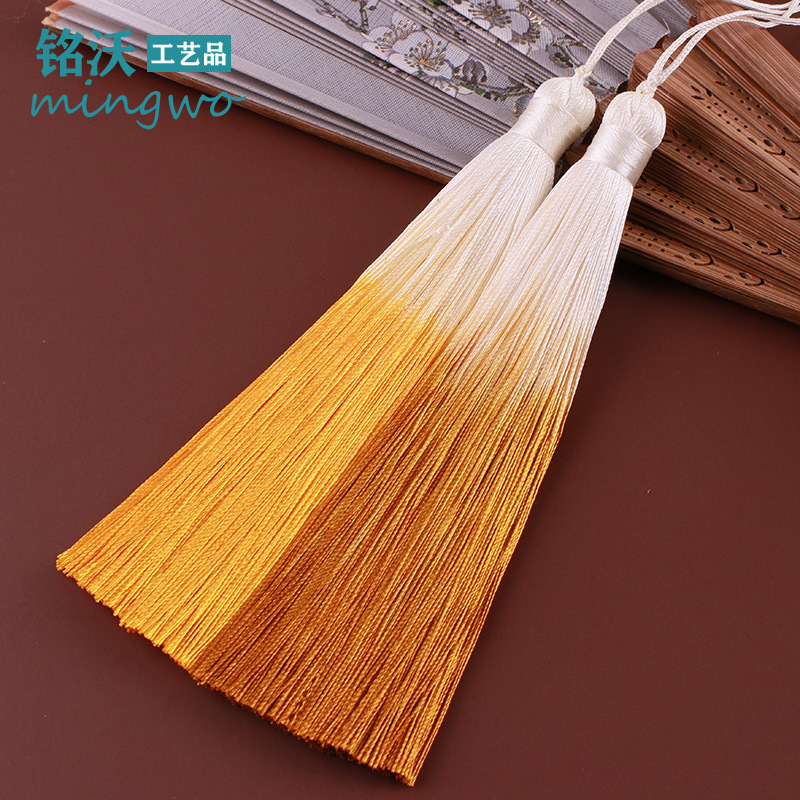 Strap with tassels