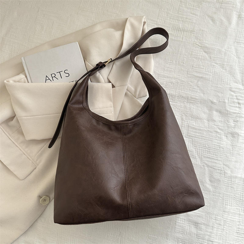 2025 primavera nueva moda bolsos de mano de hombro de gran capacidad bolsos tote bolsos de mujer bolsos de viaje bolsos versátiles para mujeres