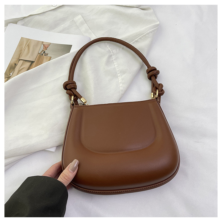 Textura color caramelo nuevo bolso femenino portátil moda moda bolso de hombro estilo occidental bolso de axila simple bolso de silla dulce