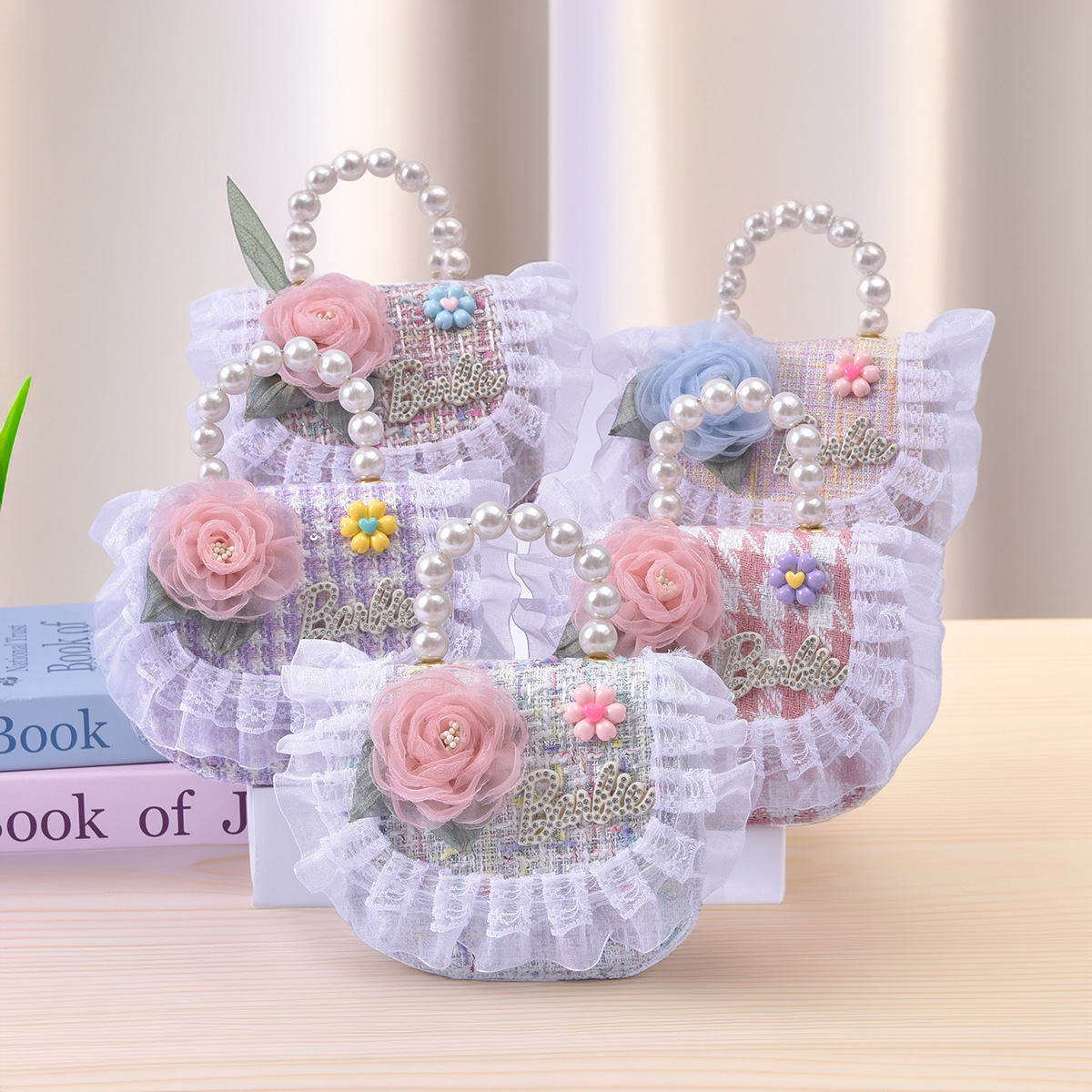 Bolsos de niños pequeños vientos de encaje tejido almacenamiento diario con perlas bolso de cambio portátil mini al por mayor