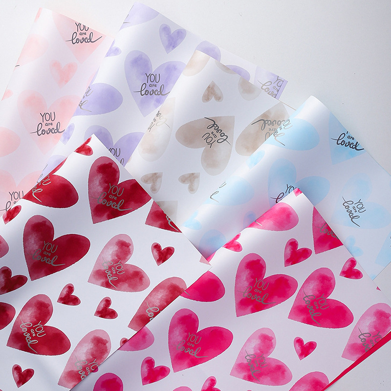 跨境一见倾心防水爱心欧雅纸情人节花束包装鲜花包装材料厂家直销