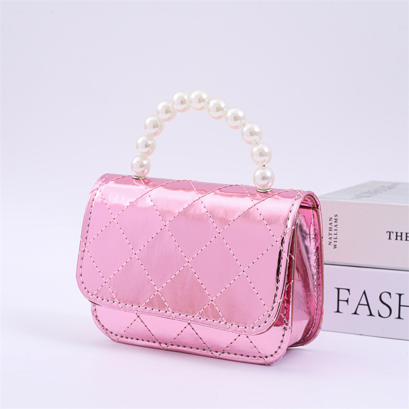2025 primavera y verano estilo caliente moda casual niños dulces bolsa de gelatina mini bolso de mensajero de un solo hombro variedad al por mayor
