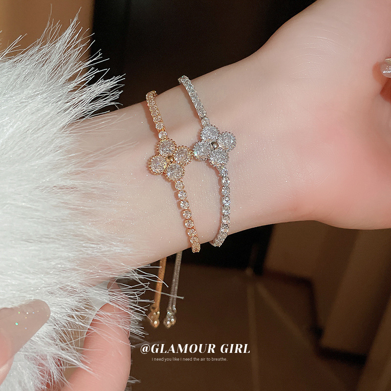 Real oro electrochapado flor ZIRCON pull-out pulsera personalizada pulsera de moda elegante luz de lujo de alta calidad pulsera al por mayor